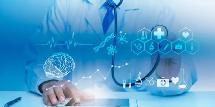 A clinician touching a digital display of connected medical data icons